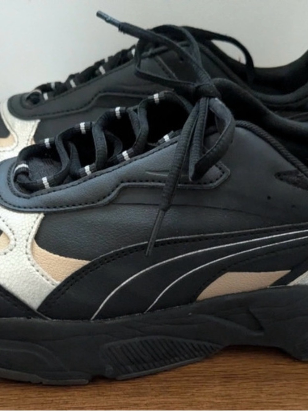 Puma Women’s Black and Beige Low-Top Sneakers